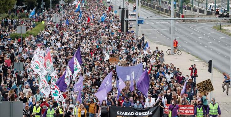 People take part in a protest for media freedom in Budapest