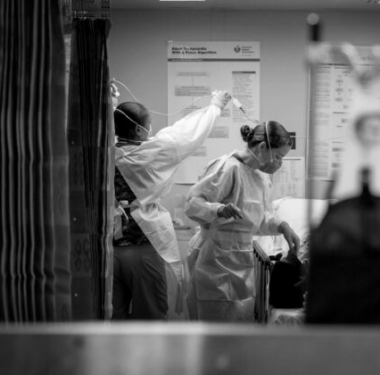 Image: Sailors treat a patient aboard the hospital ship USNS Mercy